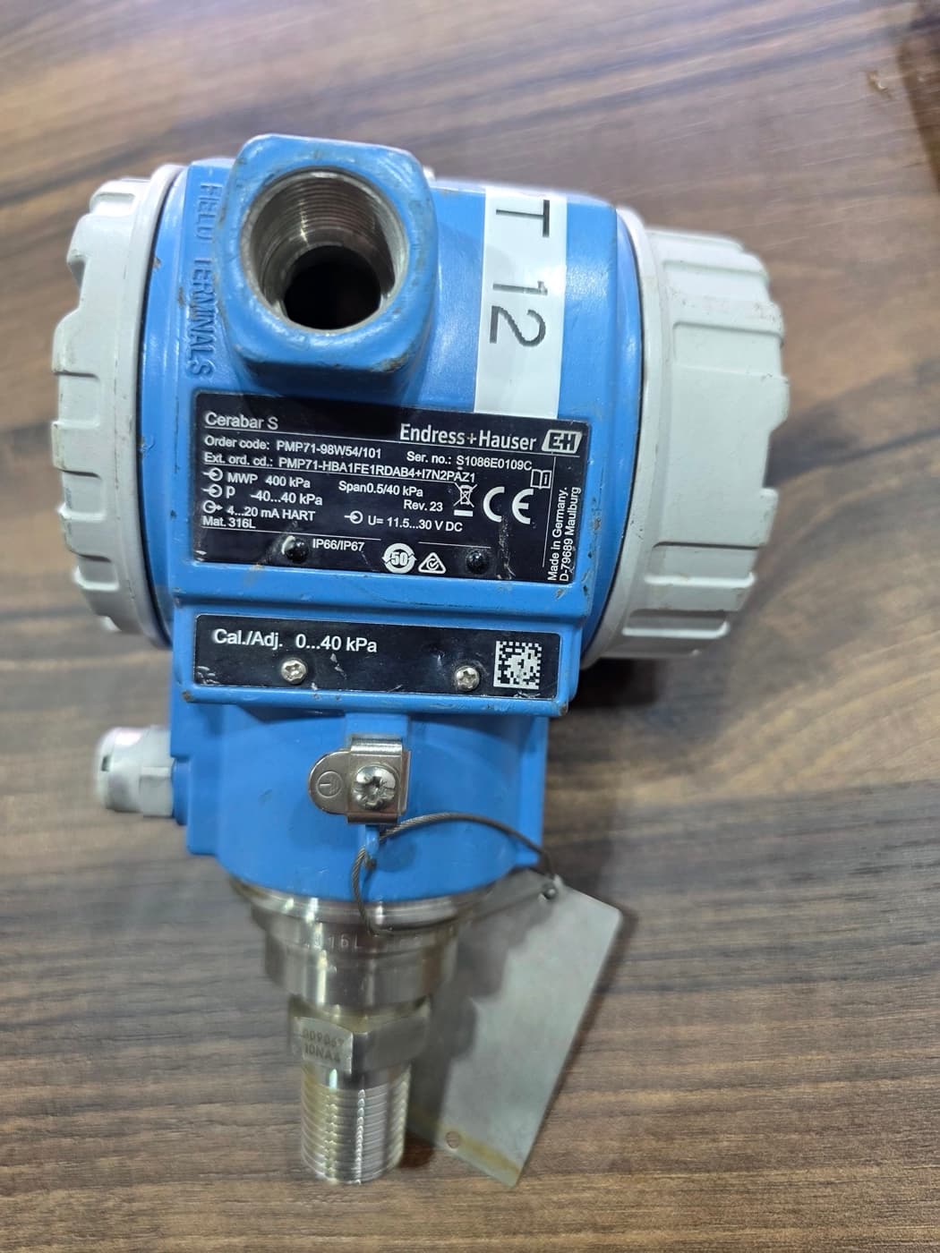 Endress+Hauser Cerabar S PMP71 in Barmaan's warehouse — close-up of one device's nameplate; every device on this page is photographed with its own plate