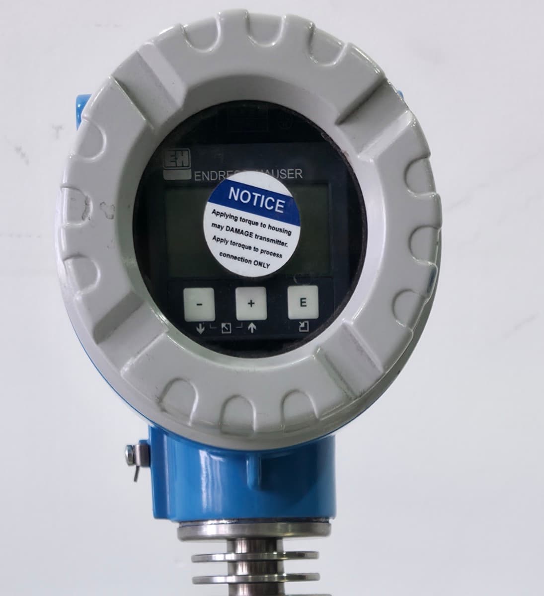 Micropilot M FMR240 transmitter head with the four-line VU331 display — the FMR240 in Barmaan's warehouse