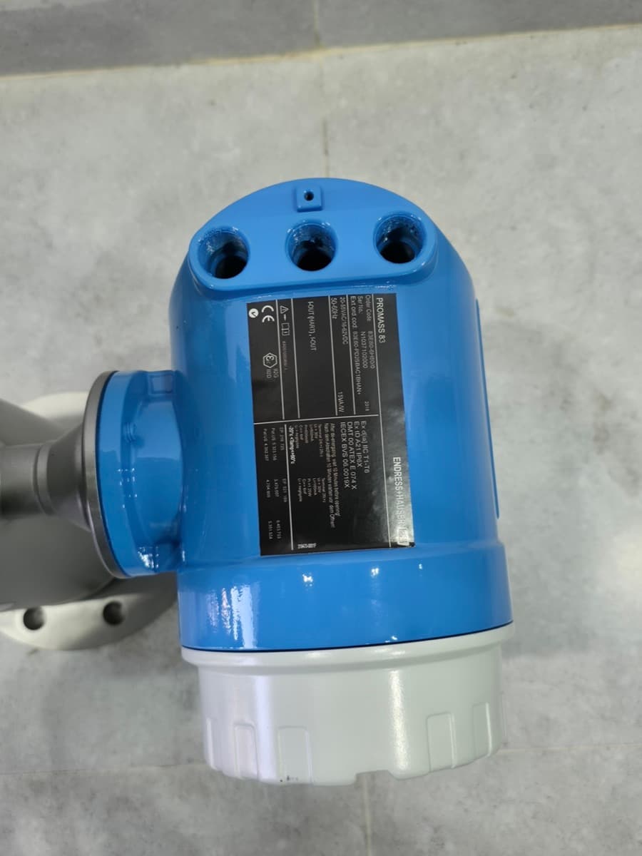 Promass 83 transmitter nameplate: order code 83E80-6H80/0, 20–55 VAC / 16–62 VDC, ATEX/IECEx