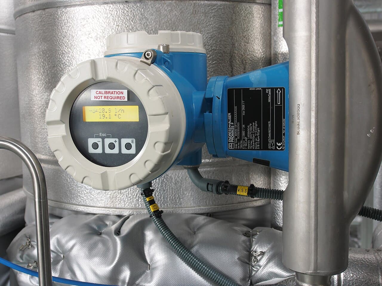 Promass Coriolis flowmeter transmitter close-up with optical touch keys