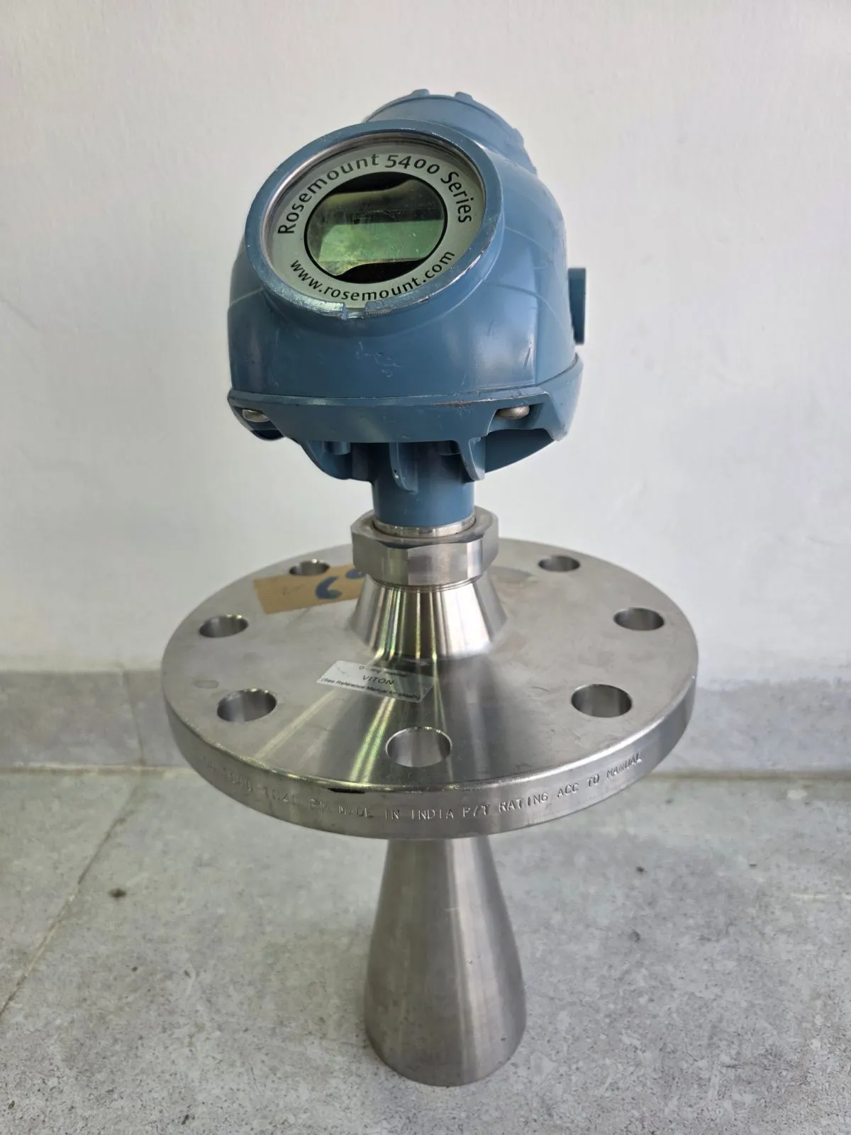 Rosemount 5402 radar level transmitter with cone antenna on a stainless-steel flange, front view