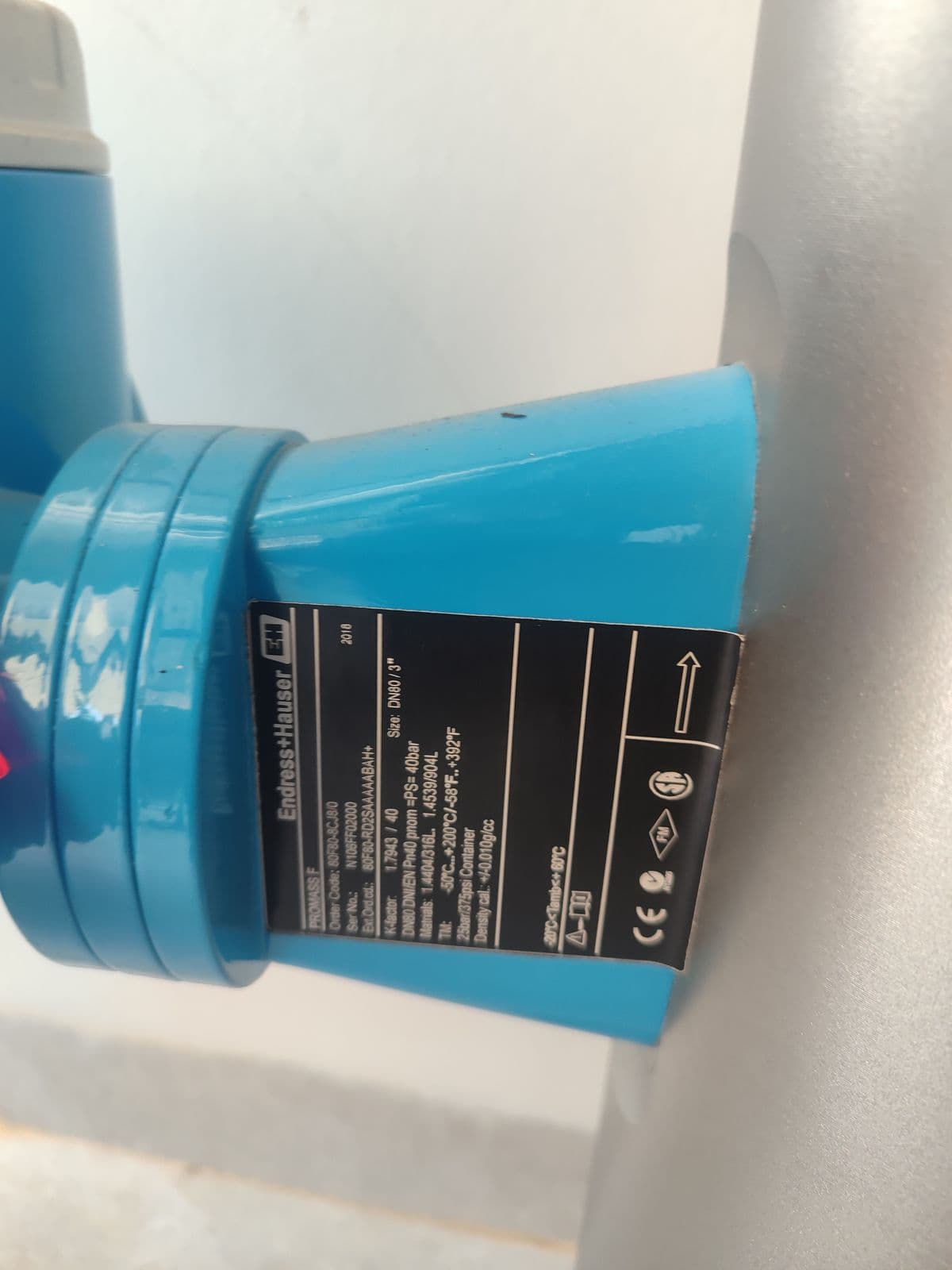 Endress+Hauser Promass 80F Coriolis Mass Flowmeter — DN80 (3") — nameplate of unit 3 in Barmaan's warehouse