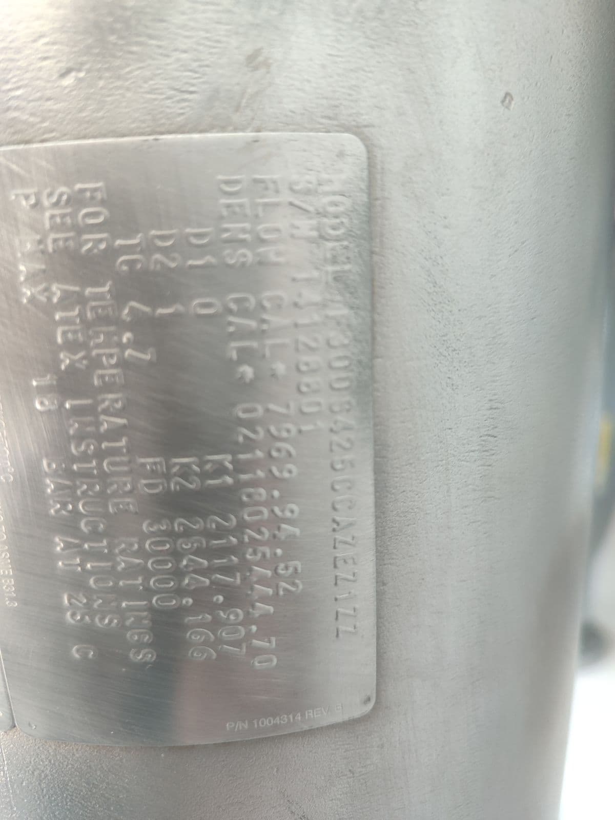 Calibration plate of the oldest meter — flow calibration factor, density coefficients, FD 30000, P MAX 18 bar at 25 °C