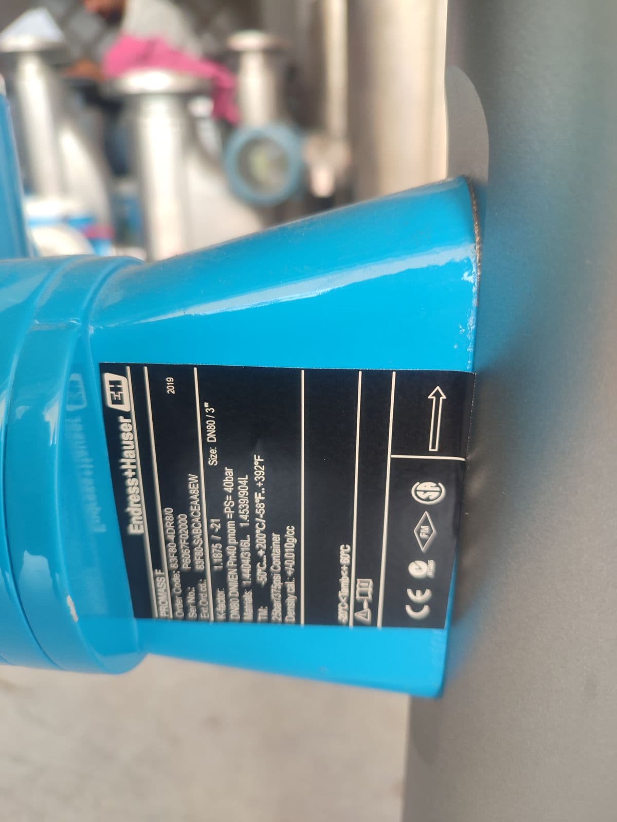 Endress+Hauser Promass 83F Coriolis Flowmeter — DN80 (3") — nameplate of unit 7 in Barmaan's warehouse