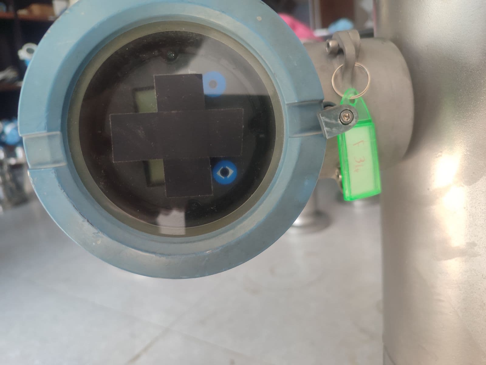 The LCD window of an integral Model 1700 head, its display protected with a cover sticker in storage