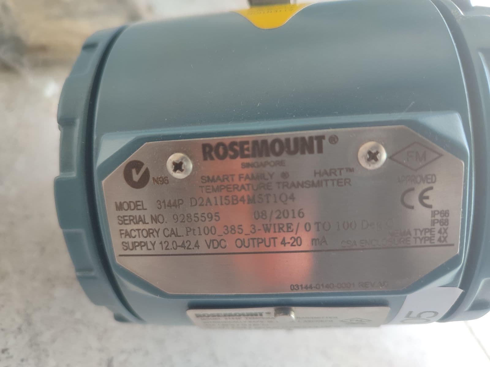 Rosemount 3144P HART temperature transmitter — main nameplate showing the model string, build date and factory calibration