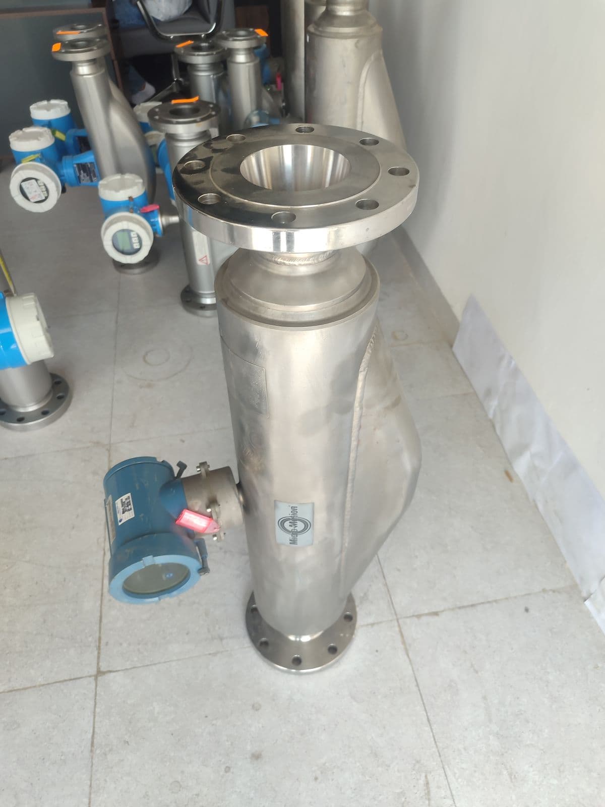 The oldest of the five meters — 4″×3″ reducing flanges, eight bolts, Micro Motion badge on the body